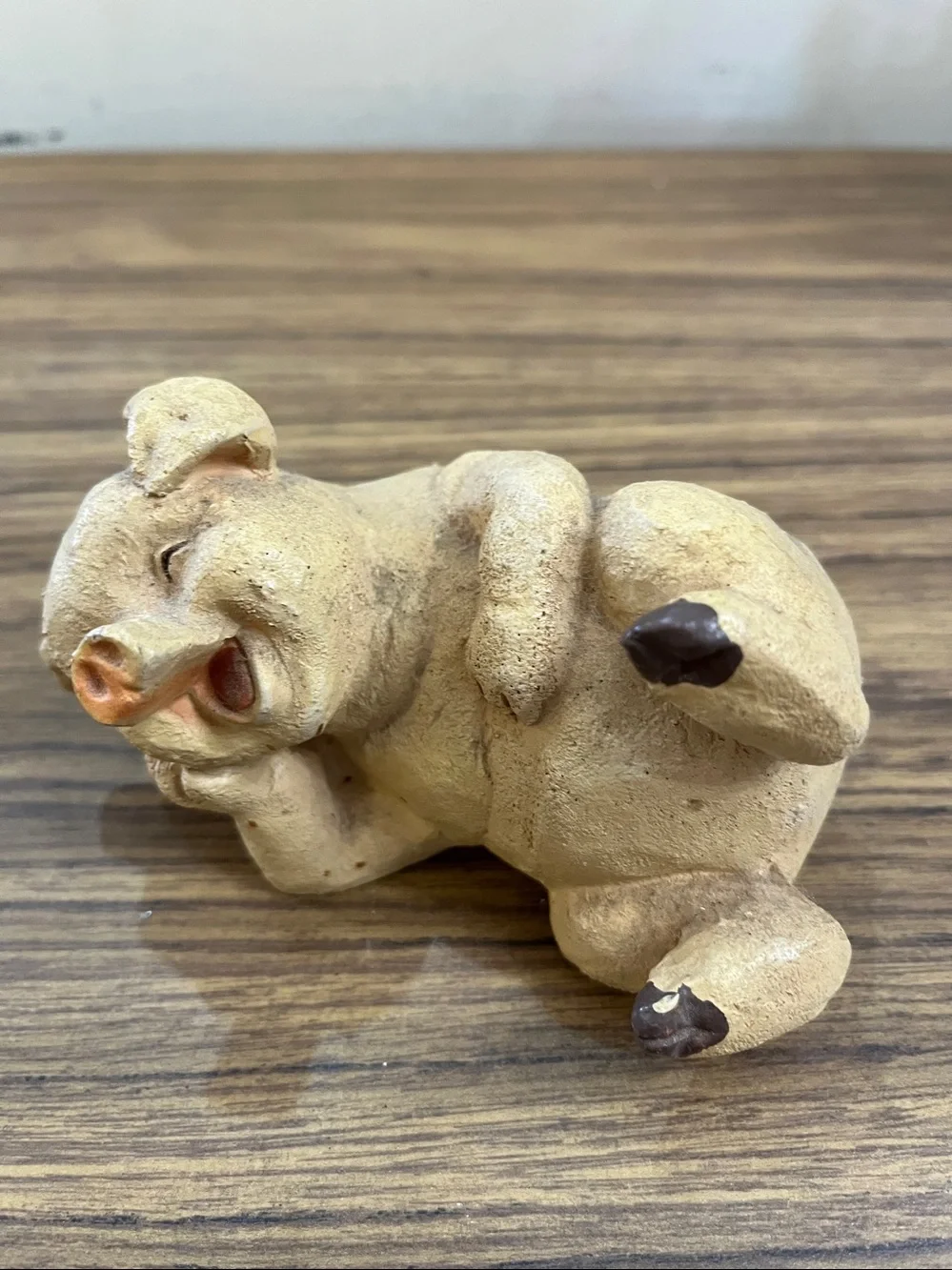 Set of three frolicking pigs